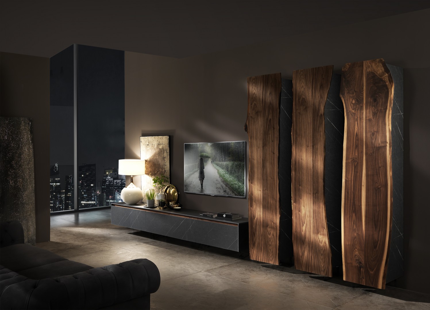 Living room di alto design. L'arredo è disegnato da Francesco Profili per la sua collezione. E' formato da colonne verticali in Noce Canaletto (Walnut).